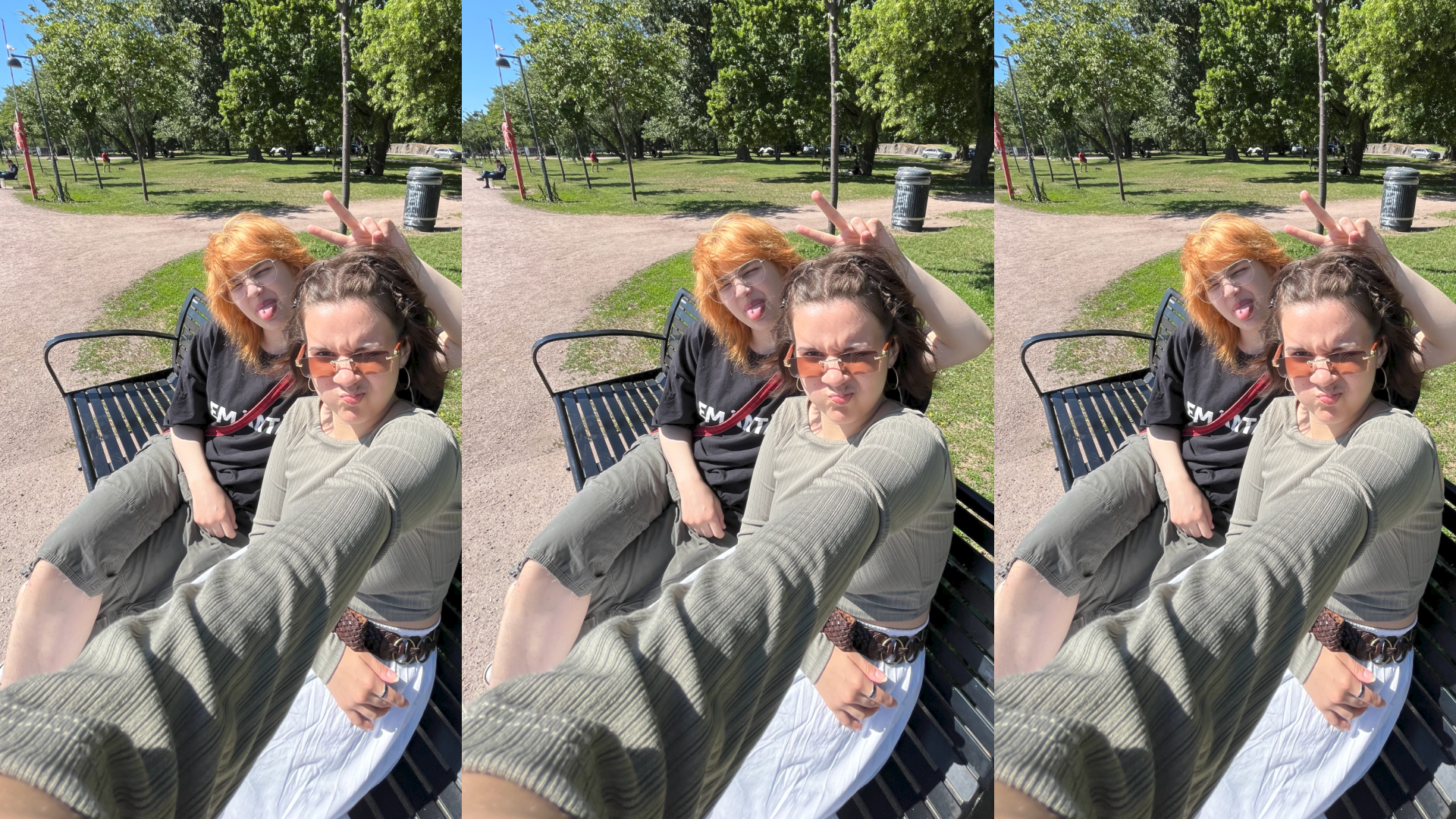 The young people are sitting on a bench in the park.